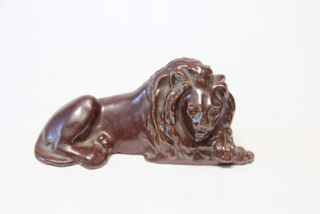 REDWARE LION: BROWN GLAZE 4 1/4" X 2"