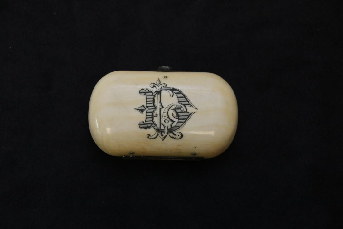 19TH CENTURY CARVED BONE PILL BOX: HAND ETCHED INITIALS ON TOP WITH GERMAN SILVER MOUNTS 3" X 2"
