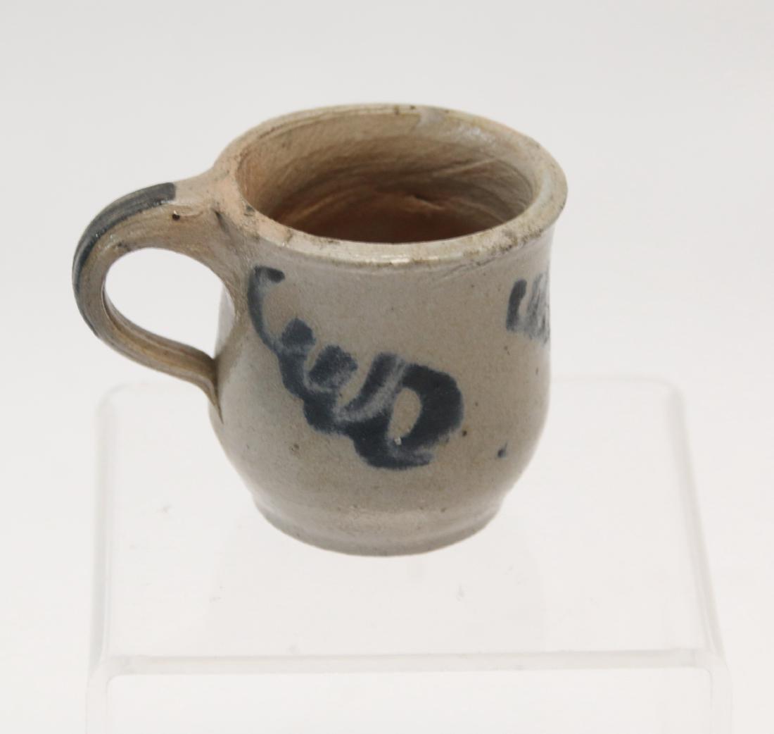 STONEWARE MINIATURE CUP WITH HANDLE (1 of 3)