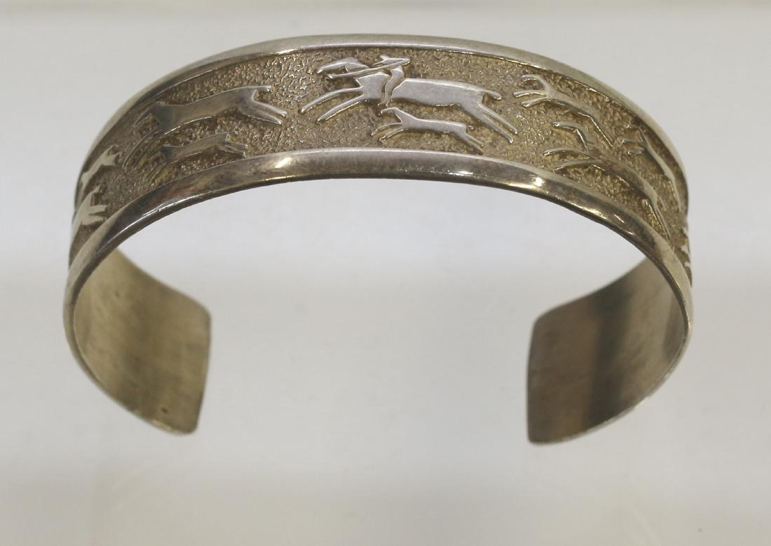 NATIVE AMERICAN STERLING SILVER CUFF BRACELET: HORSES ON RIDERS DESIGN - WITH HALLMARK - .97 OZT