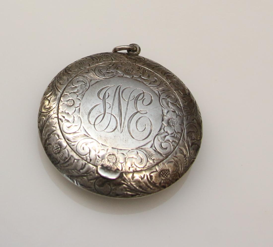 STERLING COMPACT: BRIGHT CUT ENGRAVING - MONOGRAM ON FRONT AND BACK Dimensions: 2" DIAMETER
