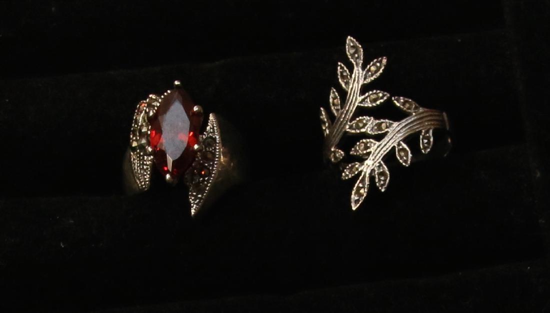 STERLING AND MARCASITE RINGS: ONE WITH GARNET Dimensions: SIZE 9