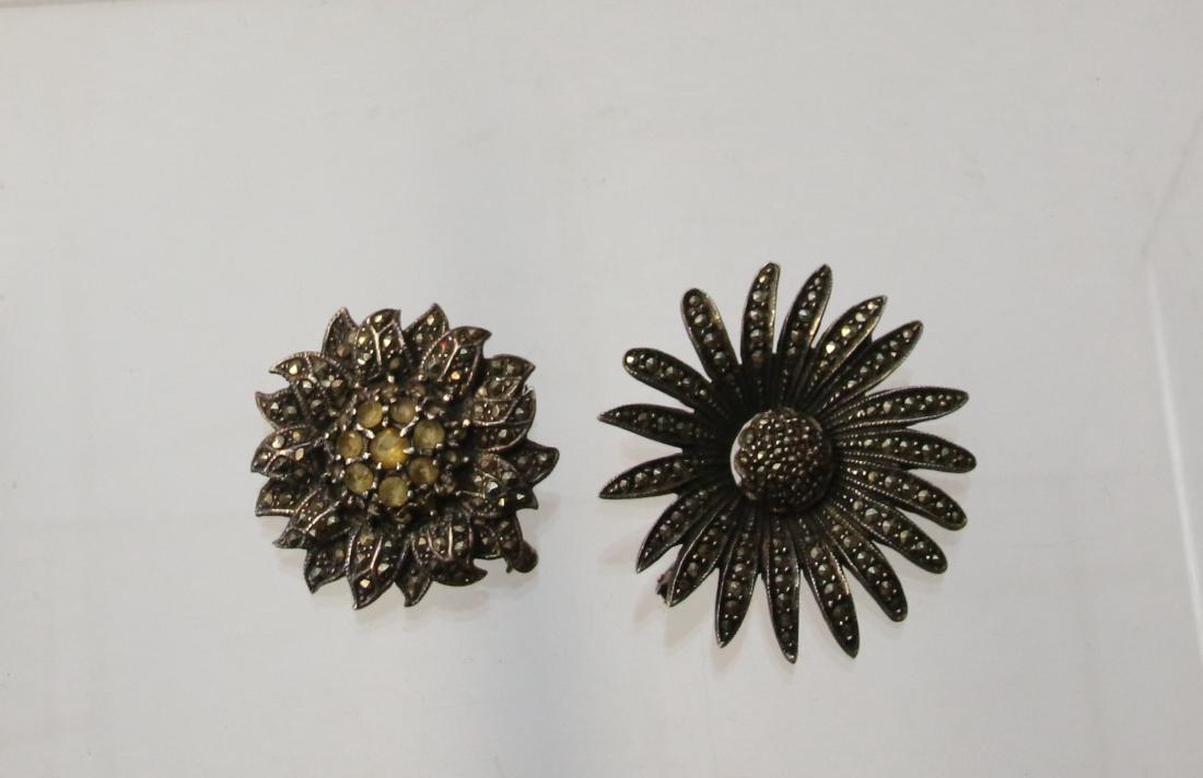 (2) STERLING AND MARCASITE BROOCHES: ONE WITH AMBER STONES Dimensions:
