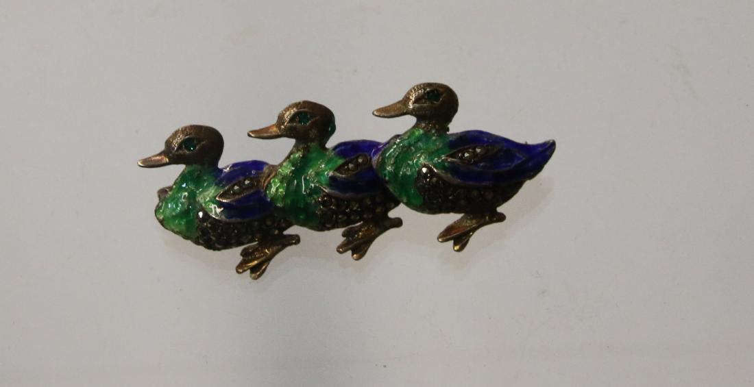 STERLING AND MARCASITE BROOCH: 3 DUCKS WITH ENAMEL - .27 OZT Dimensions: 1 3/4"