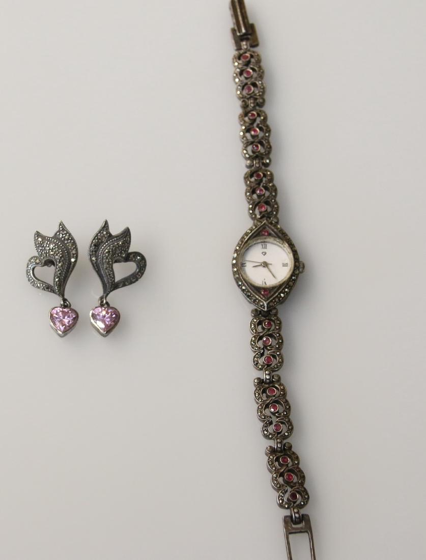 (2) STERLING AND MARCASITE ITEMS: EARRINGS WITH HEARTS - WRIST WATCH WITH RUBIES - 1.20 OZT Dimensions: WATCH 6"
