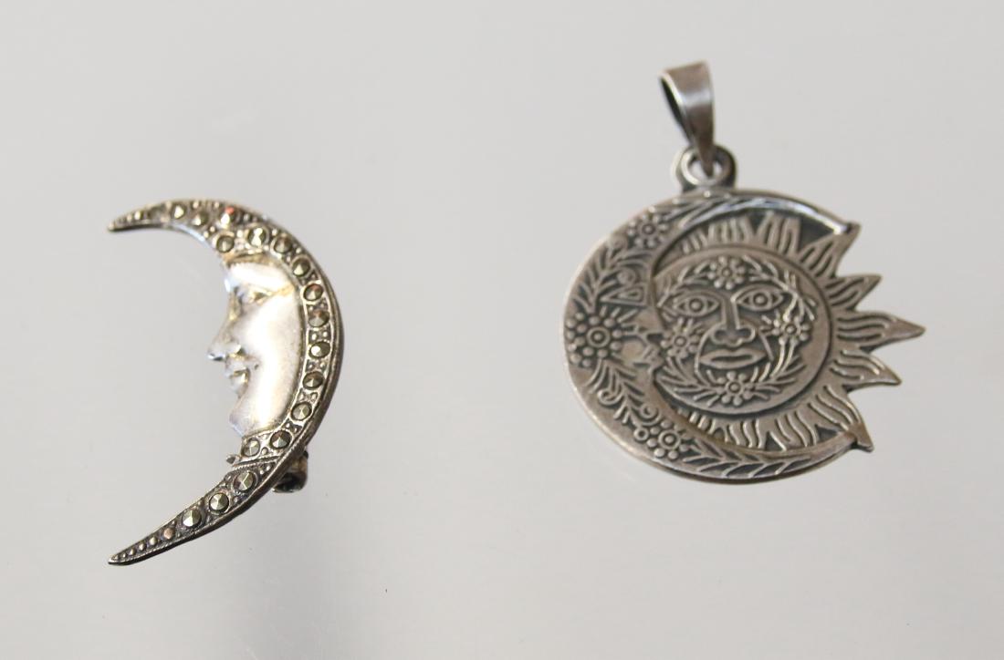 2 - STERLING MOON ITEMS: MOON BROOCH AND MARCASITE - MOON AND SUN PENDANT - .55 OZT Dimensions: 1 1/3" DIAMETER
