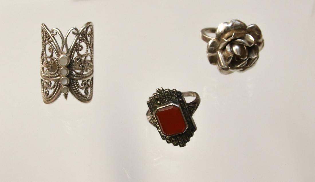 3 - STERLING RINGS: FLOWERED - FILIGREE - MARCASITE Dimensions: SIZES 5.5/5/6