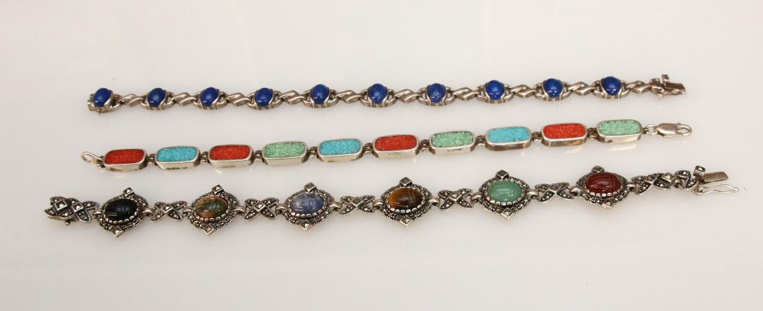 3 - STERLING BRACELETS: CRUSHED STONES, BLUE STONES, AND MARCASITE AND SCARAB - 2.0 OZT Dimensions: 7"