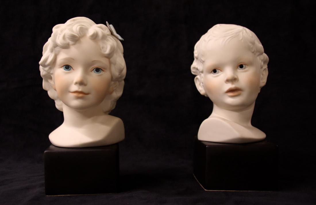 PAIR OF CYBIS BUST: BOY AND GIRL Dimensions: 9" X 4"