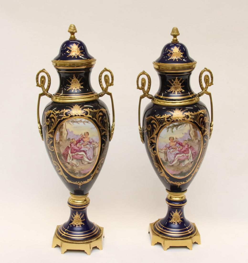 PR OF PORCELAIN URNS (1 of 3)