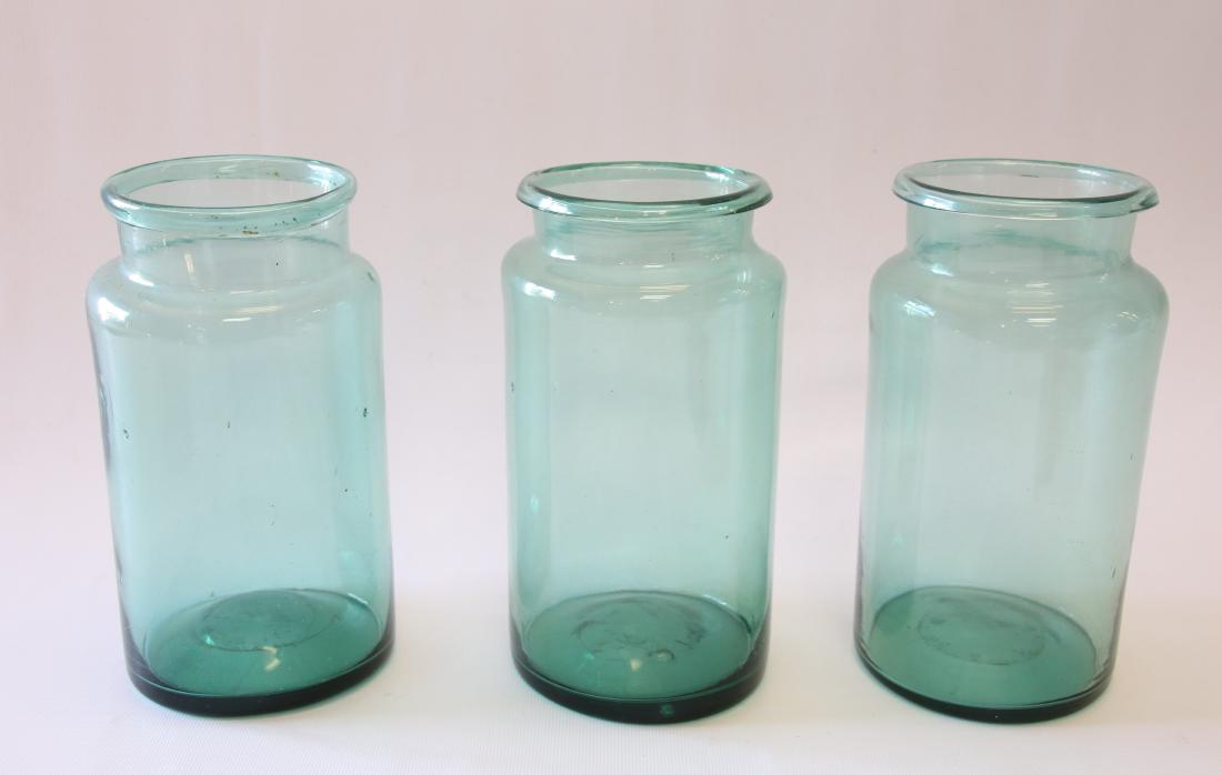GROUP OF BLOWN GLASS STORAGE JARS (1 of 3)