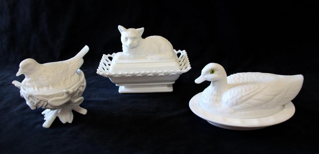 GROUP LOT OF EARLY MILK GLASS: INCLUDING - COVERED CAT DISH MARKED 1889, BIRD ON A NEST MARKED "WG", AND DUCK ON A NEST WITH GLASS EYES
