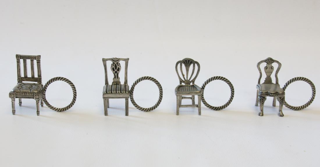 GROUP OF EARLY NAPKIN RINGS: STIEFF PEWTER NAPKIN RINGS - IN THE FORM OF CHAIRS