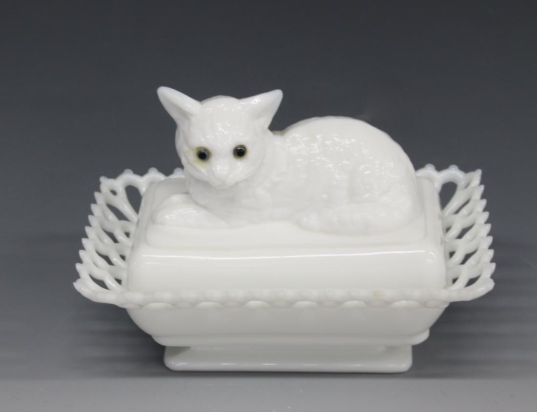 MILK GLASS COVERED DISH: IN THE FORM OF A CAT - WITH GLASS EYES - BASE MARKED "WG"
