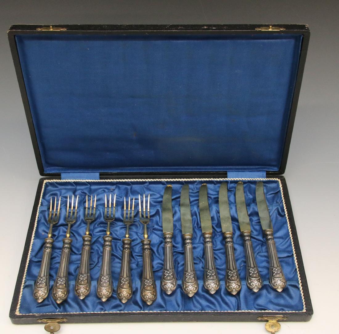 SILVER FLATWARE SERVICE (1 of 2)