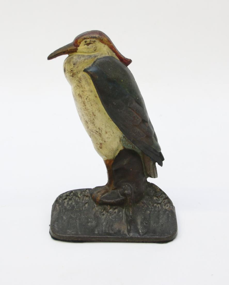 ANTIQUE CAST IRON DOORSTOP (1 of 4)