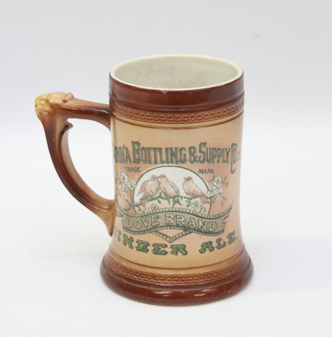 PORCELAIN ADV. MUG: PORCELAIN ADV. MUG PENN'A BOTTLING & SUPPLY CO. - DOVE BRAND GINGER ALE DIMENSIONS: 5 1/4"