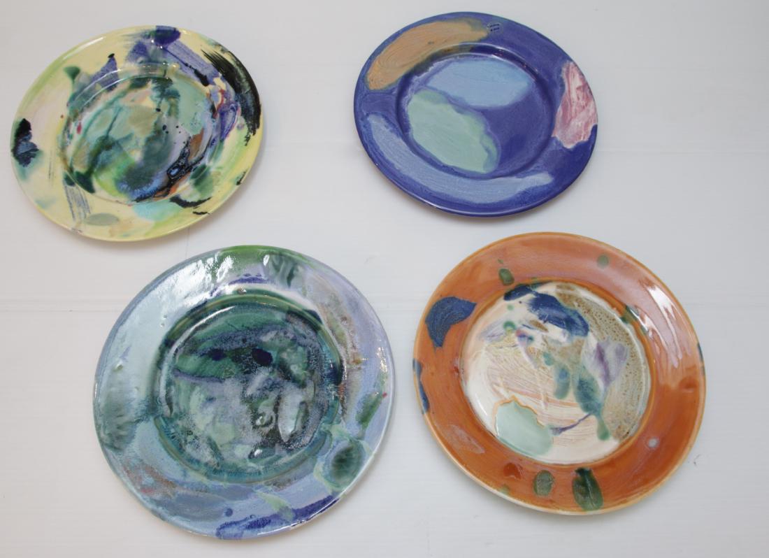 (4) ART POTTERY PLATES (1 of 2)