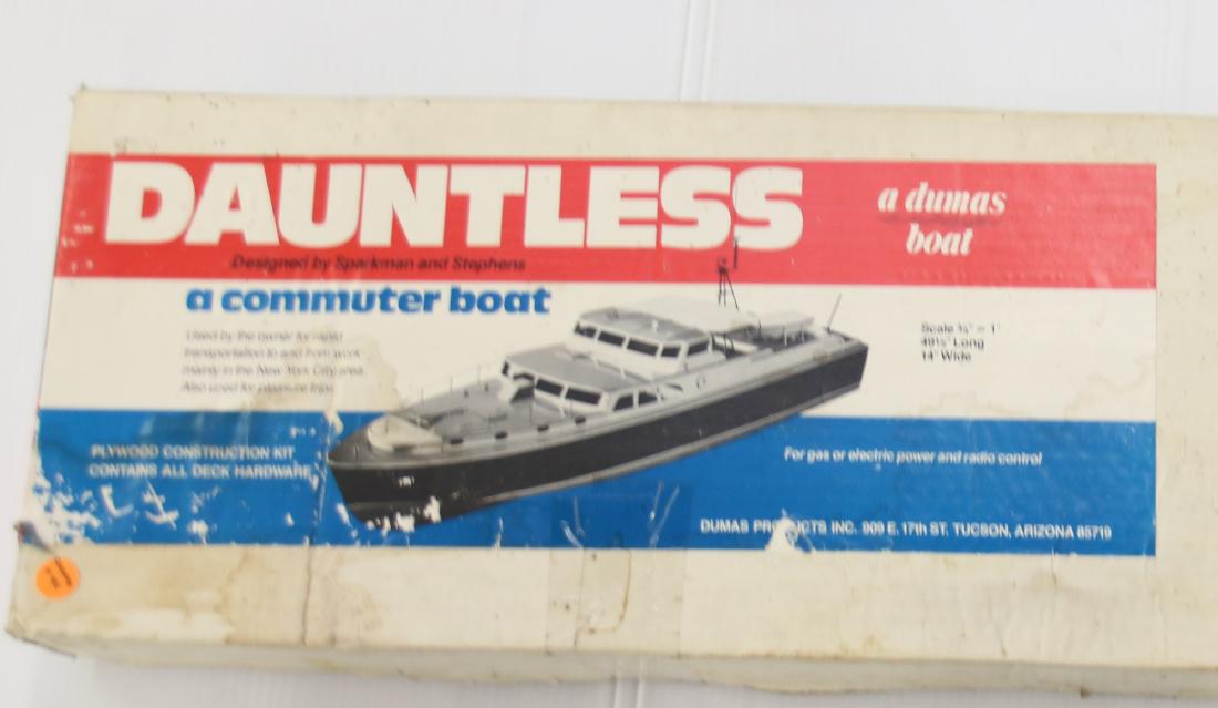 Dumas Products (a dumas boat): Dauntless, a commuter boat, 49 1/2 x 14"