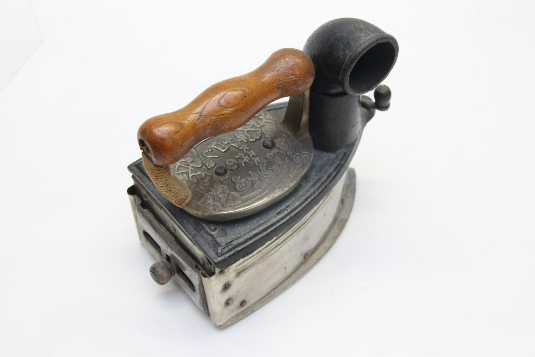 CHARCOAL IRON: CHARCOAL WITH SWIVEL AND REMOVABLE CHIMNEY 6 1/2"