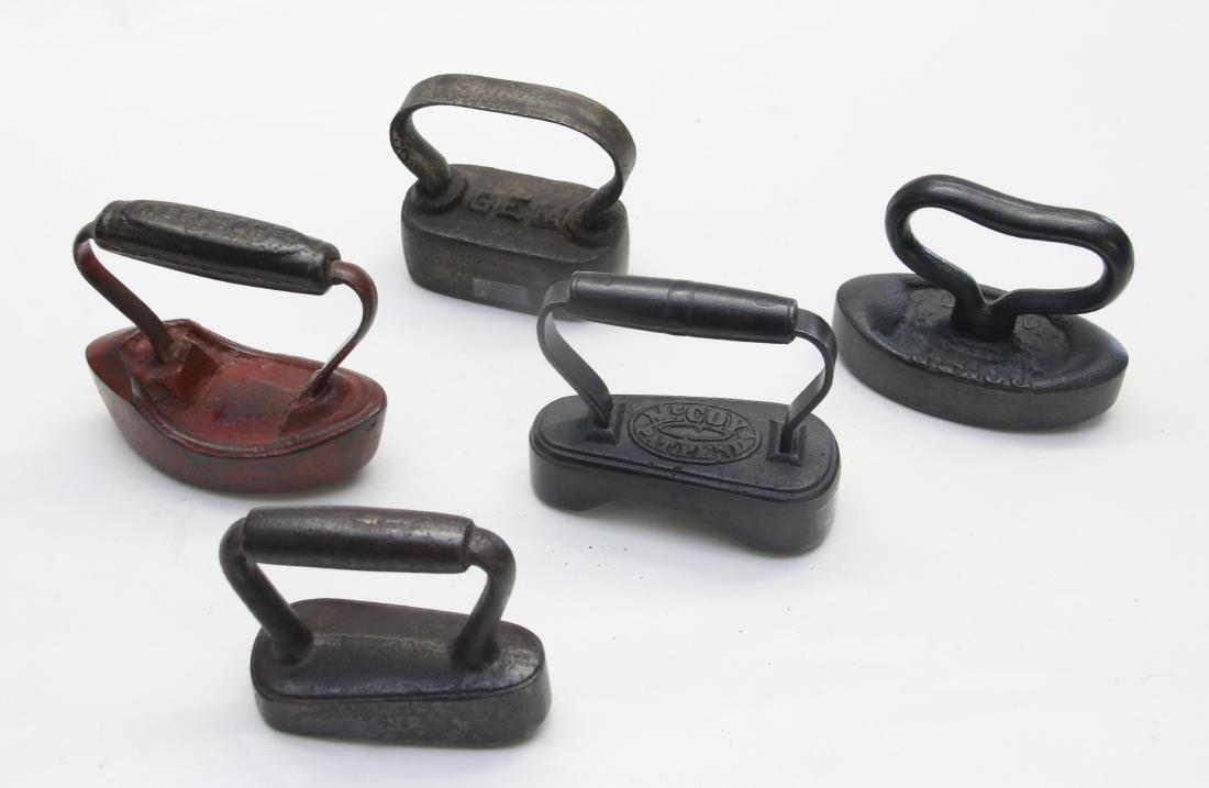 GROUP LOT OF ANTIQUE IRONS: (5) INCL. 2-PLEATING IRONS "KEYSTONE", "GEM" HAT IRON, MC.COY PLEATING IRON, PLEATING IRON PAT.1861