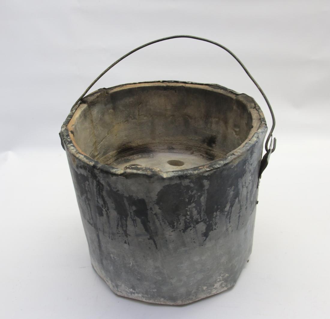 ANTIQUE BUCKET HEATER: HOLDS 3 IRONS - MADE OF CLAY WITH TIN COVERING 11 1/2" X 9 1/2"