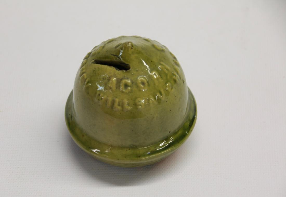 POTTERY ADVERTISING BANK: GREEN GLAZE "ACORN STOVES" Dimensions: 3 1/4" X 3"
