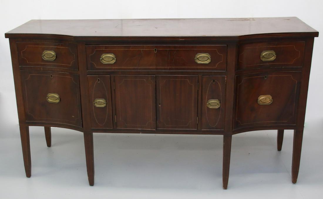 SHERATON STYLE SIDEBOARD: BANDED TOP AND FRONT INLAY - ORIGINAL PRESSED BRASS PULLS - TAPERED LEGS - 3 DRAWER OVER 4 DRAWER AND 2 DOORS Dimensions: 67" X 22" X 36 1/2"