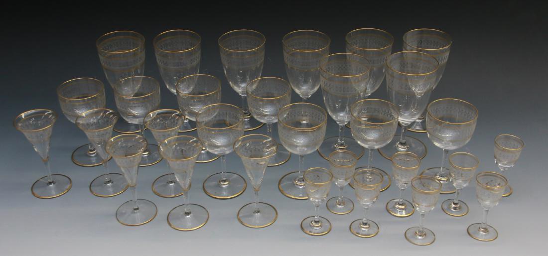 LOT OF STEMWARE: ENAMELED AND GOLD TRIMMED WITH GREEK KEY DESIGN (8) WINE GLASSES - (8) CORDIALS - (6) BRANDIES - (12) TUMBLERS - (10) JUICE GLASSES Dimensions: 6" - 4 3/4" - 4 1/2" - 3 1/4" - 3 1/2" - 3 1/2"