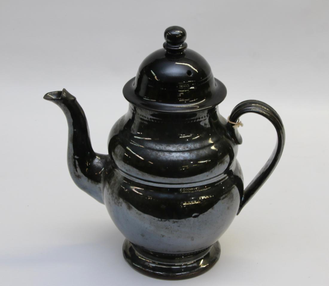 REDWARE TEAPOT: MOLDED TEA POT WITH STRAP HANDLE AND DOME LID Dimensions: 10 1/2" H