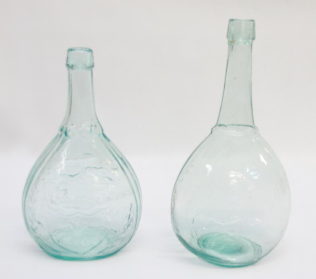 PR. OF CALABASH FLASKS: BLOWN GLASS FLASKS IN AUGO - ONE IS PLAIN - ONE MARKED UNION WITH EAGLE REVERSE Dimensions: 10 1/4" 9 1/4"