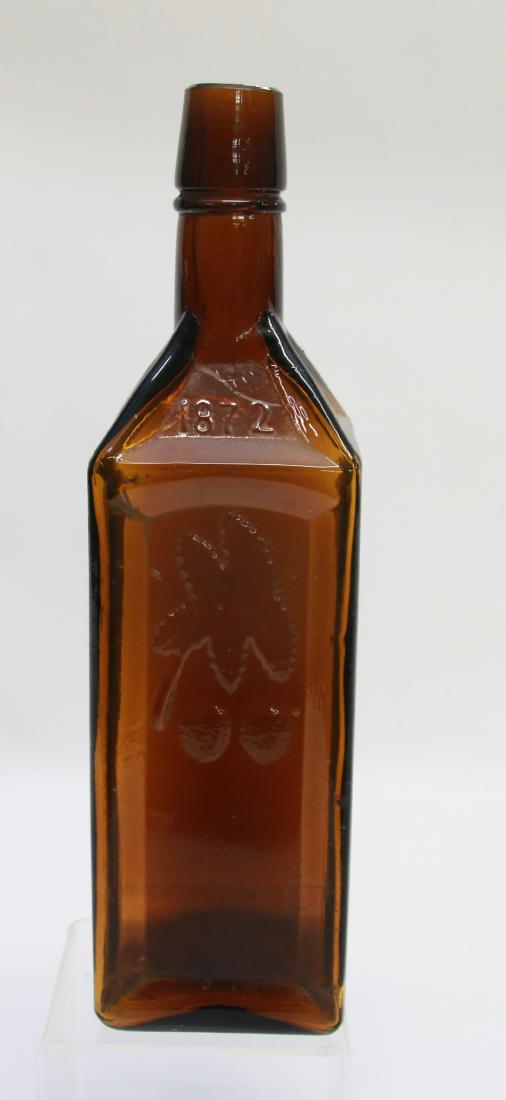AMBER BITTERS BOTTLE: DOYLES HOP BITTERS 1872 - 4 SIDED BOTTLE Dimensions: 9 1/2"