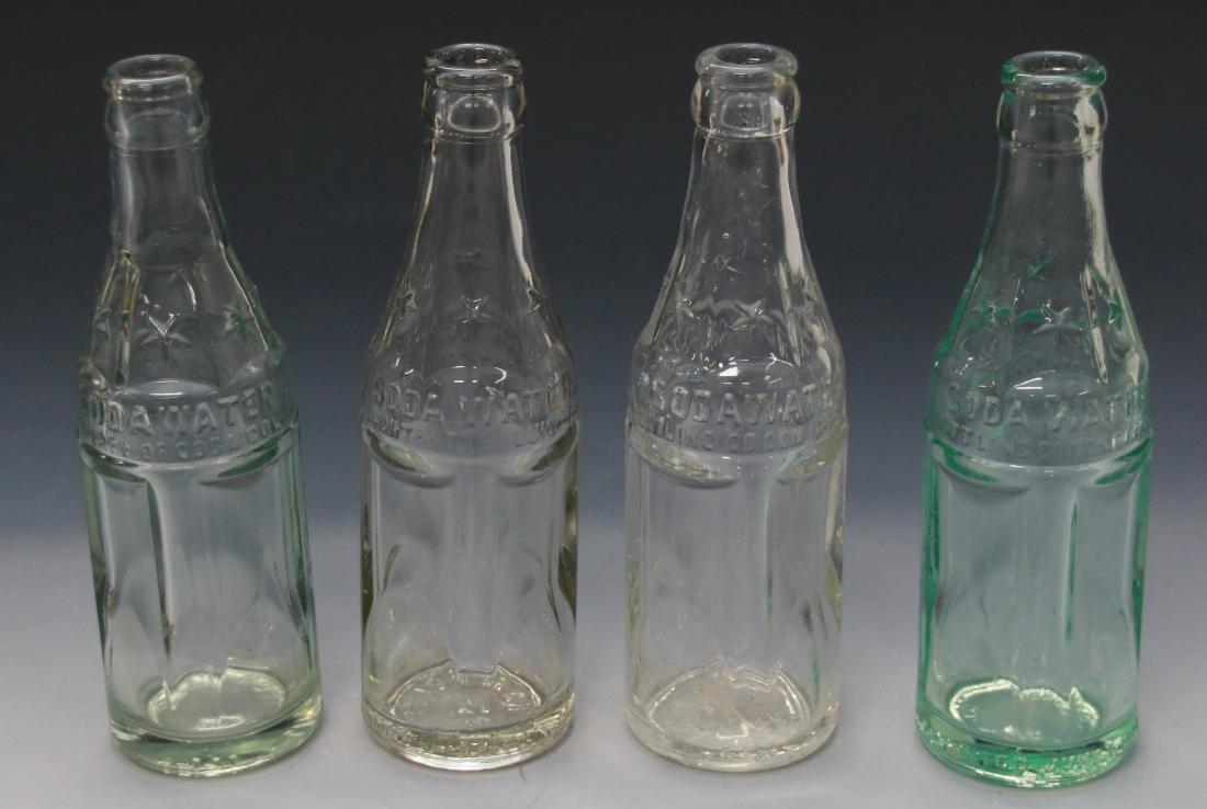 GROUP LOT OF SODA WATER BOTTLES: (3) CLEAR AND ONE GREEN. MARKED "SODA WATER" PROPERTY OF COCA COLA - LITCHFIELD, ILL. - CRASS - HARRISBURG, PA - PETERSBURG, VA Dimensions: 7 3/4" H