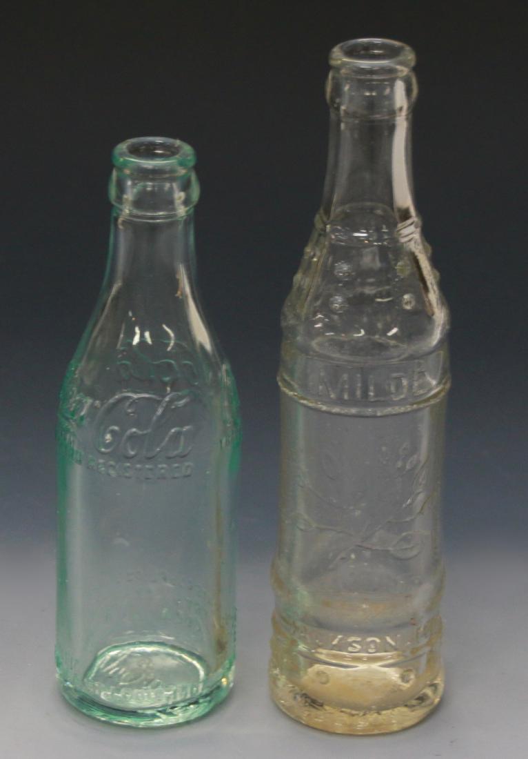 PR. OF COCA COLA BOTTLES: CLEAR EMBOSSED BOTTLE MARKED "MILDE" PROPERTY OF COCA COLA ON BOTTLE JACKSON, MO - STRAIGHT SIDED COCA COLA ST. LOUIS, MO Dimensions: 9" AND 7 1/2"