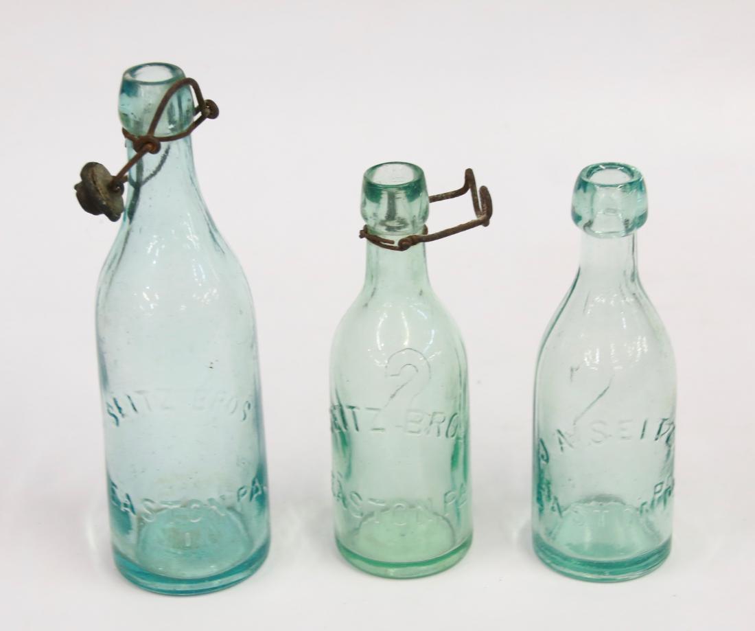 GROUP LOT OF EASTON, PA BOTTLES: (3) INCLUDING - TWO SEITZ BROTHERS AND ONE J.A. SEITZ Dimensions: 7" TO 9"