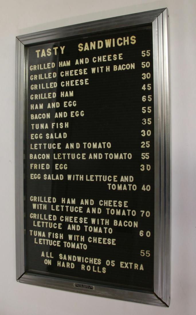 VINTAGE DINER PRICE FOOD BOARD: METAL, GLASS, AND PLASTIC Dimensions: 15" X 25"