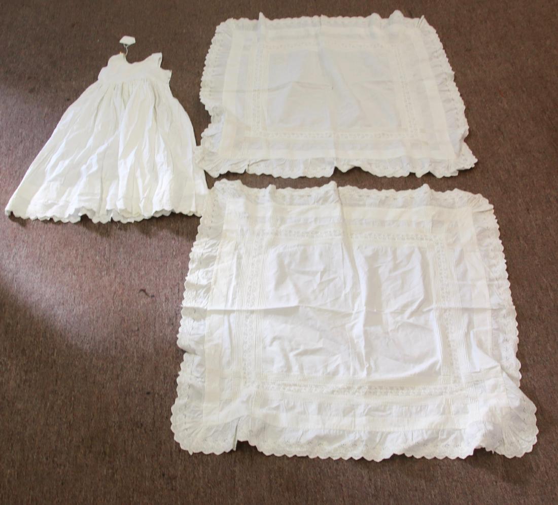 GROUP LOT OF DRY GOODS: CHILDS DRESS AND (2) TABLE COVERINGS