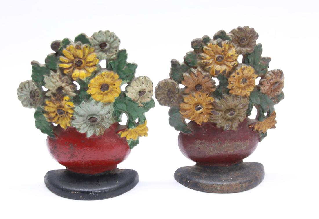 PR. OF CAST IRON DOORSTOPS: HAND PAINTED FLOWER BASKETS