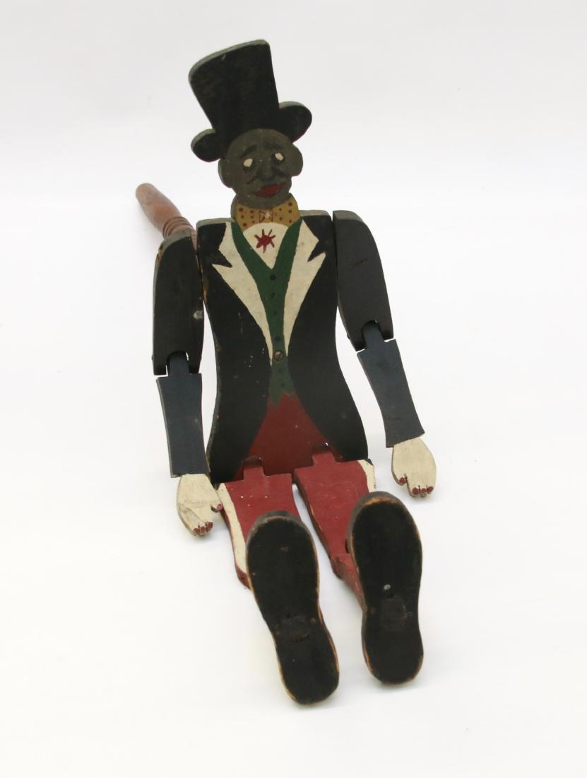 CARVED BLACK AMERICANA FIGURE (1 of 2)