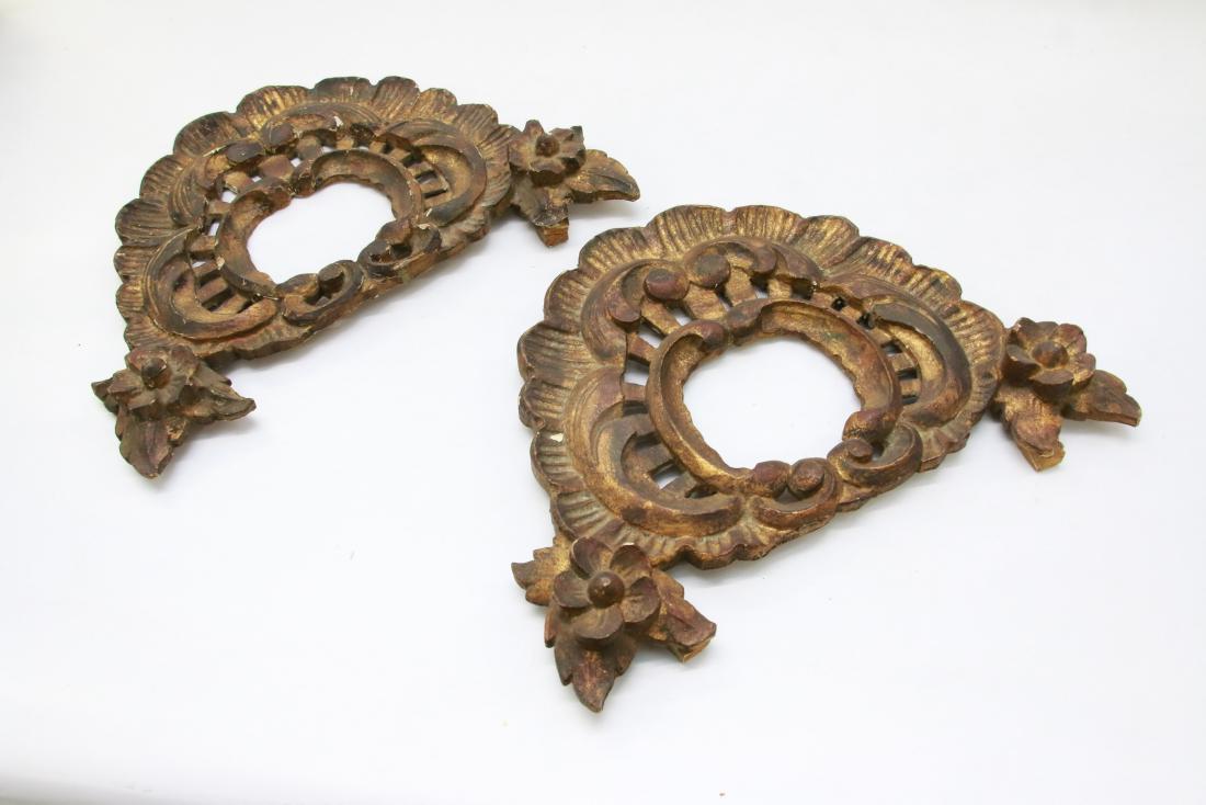 GILT WOOD ARCHITECTURAL PIECES: IN THE FORM OF A WREATH WITH FLOWERS , 15" X 12"
