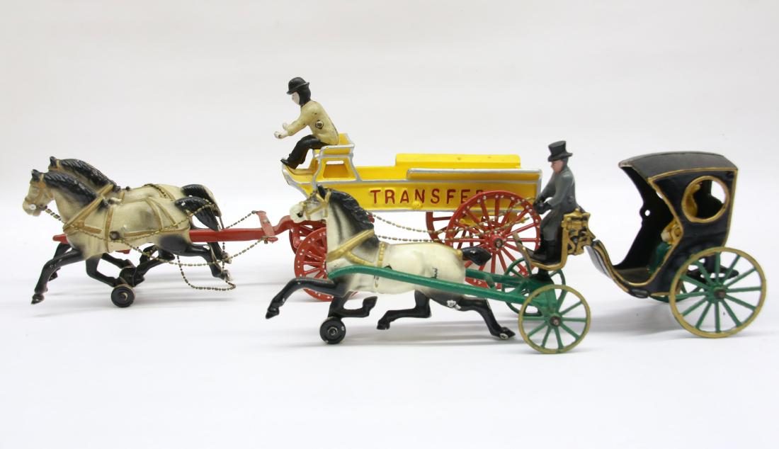 PR. OF CAST IRON TOYS: INCLUDING - TWO HORSE WAGON WITH DRIVER MARKED "TRANSFER" ON WAGON - ONE HORSE HANSOM CAB WITH DRIVER AND RIDER - ORIGINAL PAINT , 16" TO 20" L
