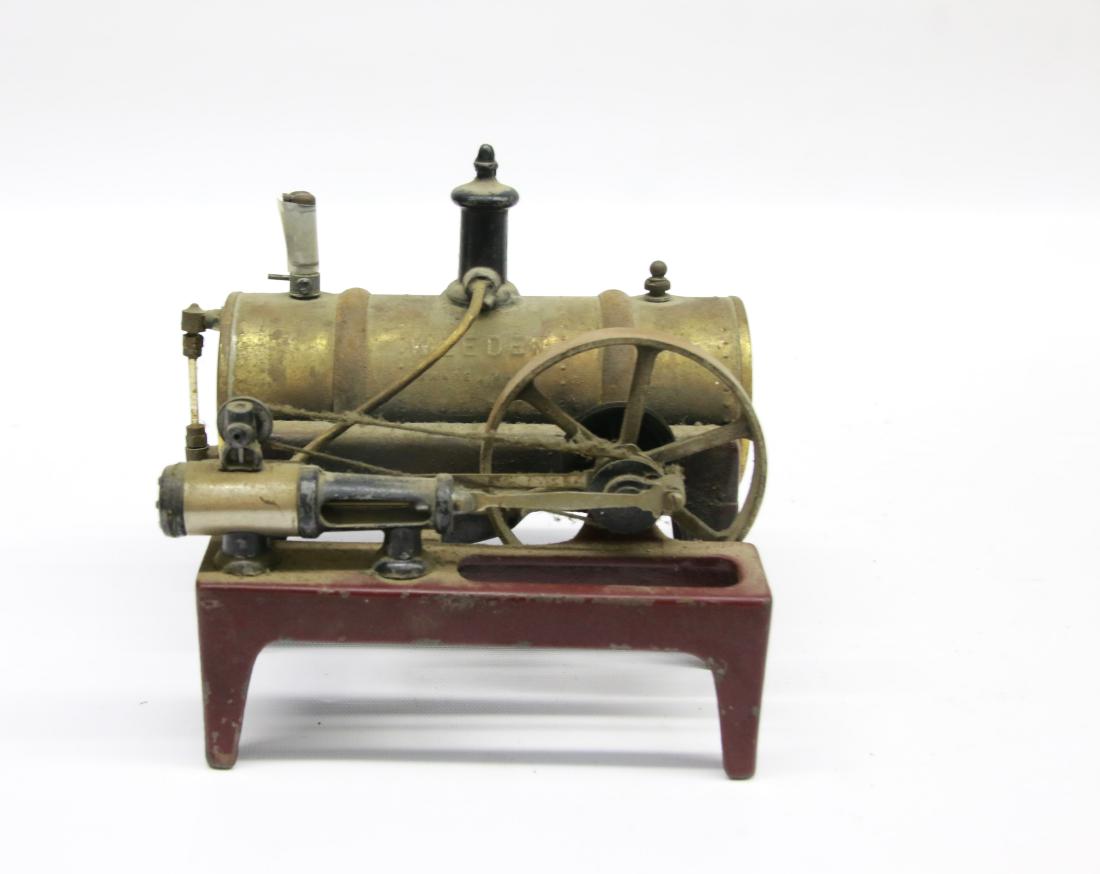 VINTAGE WEEDEN STEAM ENGINE: CAST IRON AND BRASS WITH TANK AND FLYWHEEL , 7" X 6" X 6"