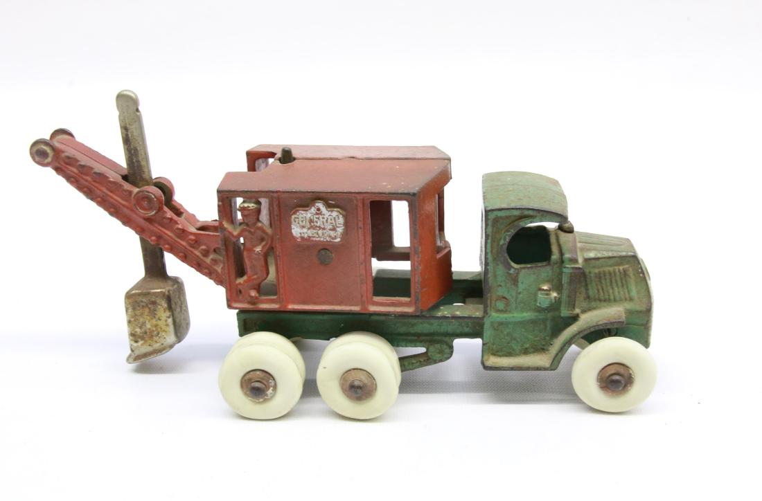 HUBLEY CAST IRON DIGGER: ORIGINAL PAINT - REPLACED TIRES - MARKED "GENERAL" , 10 1/2"