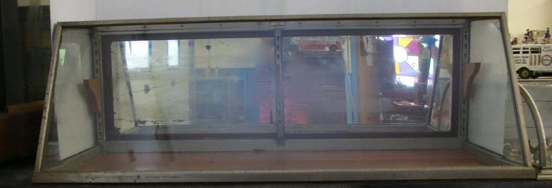 VINTAGE STORE DISPLAY CASE: BEVELED GLASS SLANT FRONT - MIRRORED DOORS IN BACK - NICKEL TRIM, 60" X 24" X 19" H