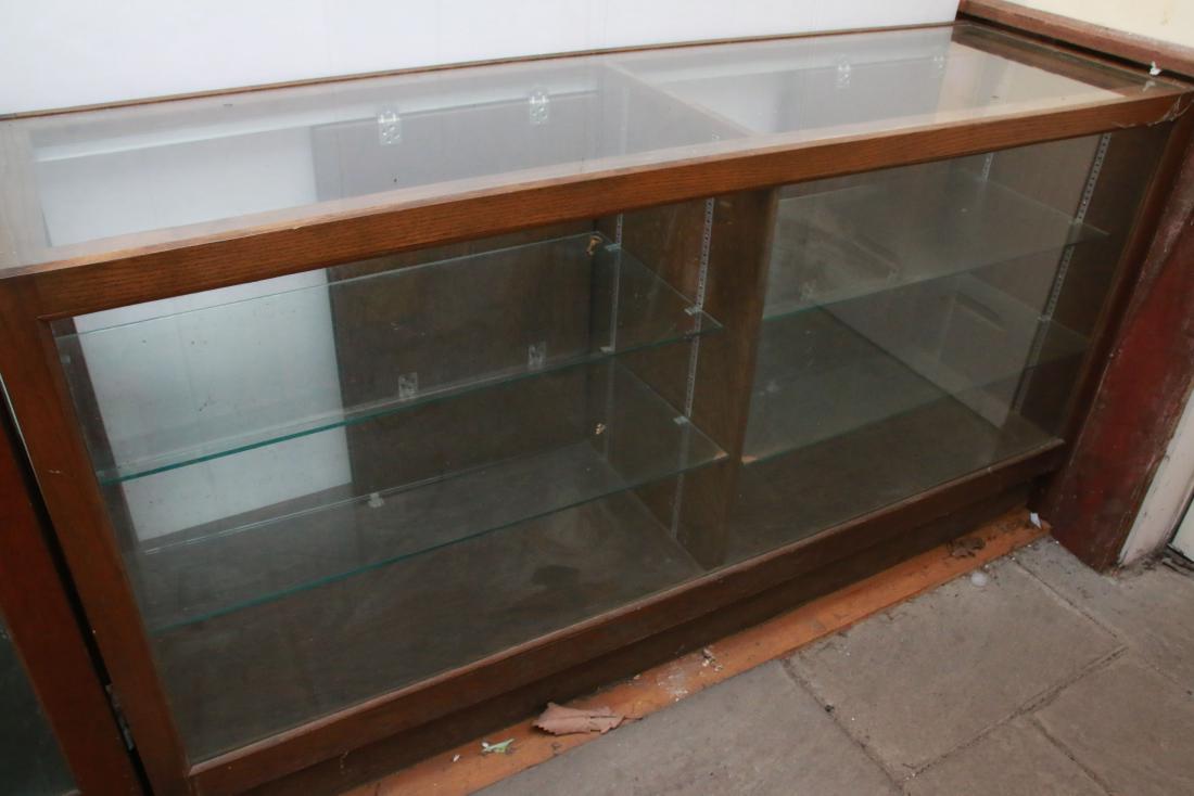 VINTAGE STORE DISPLAY CASE: GLASS AND OAK WITH INTERIOR GLASS SHELVES , 68" X 20" X 36"