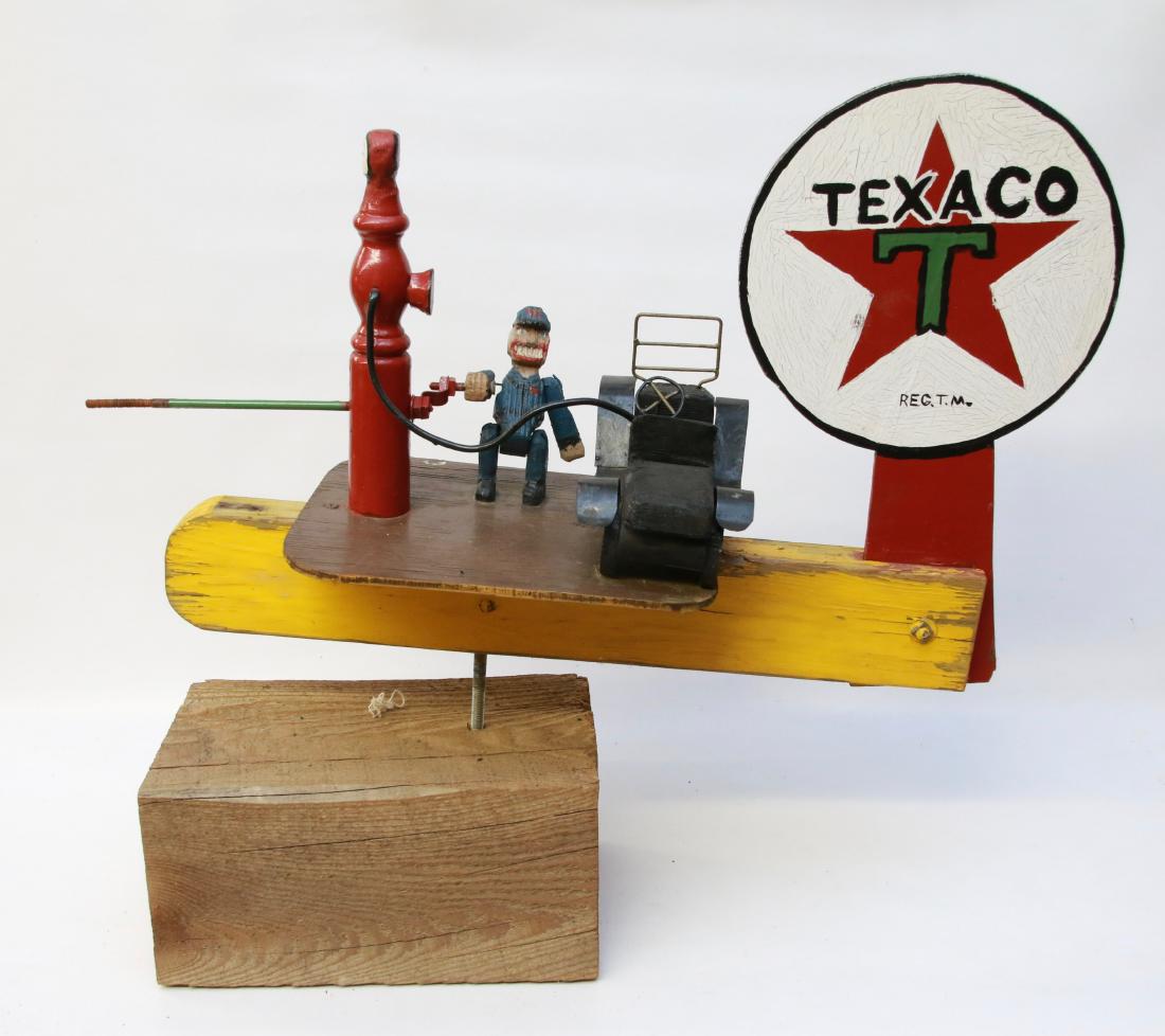 VINTAGE FOLK ART WOODEN WHIRLIGIG: PAINTED WOODEN GAS PUMPING STATION "TEXACO" - HAND CARVED - STAMPED ON BOTTOM - NO PROPELLER Dimensions:24" L