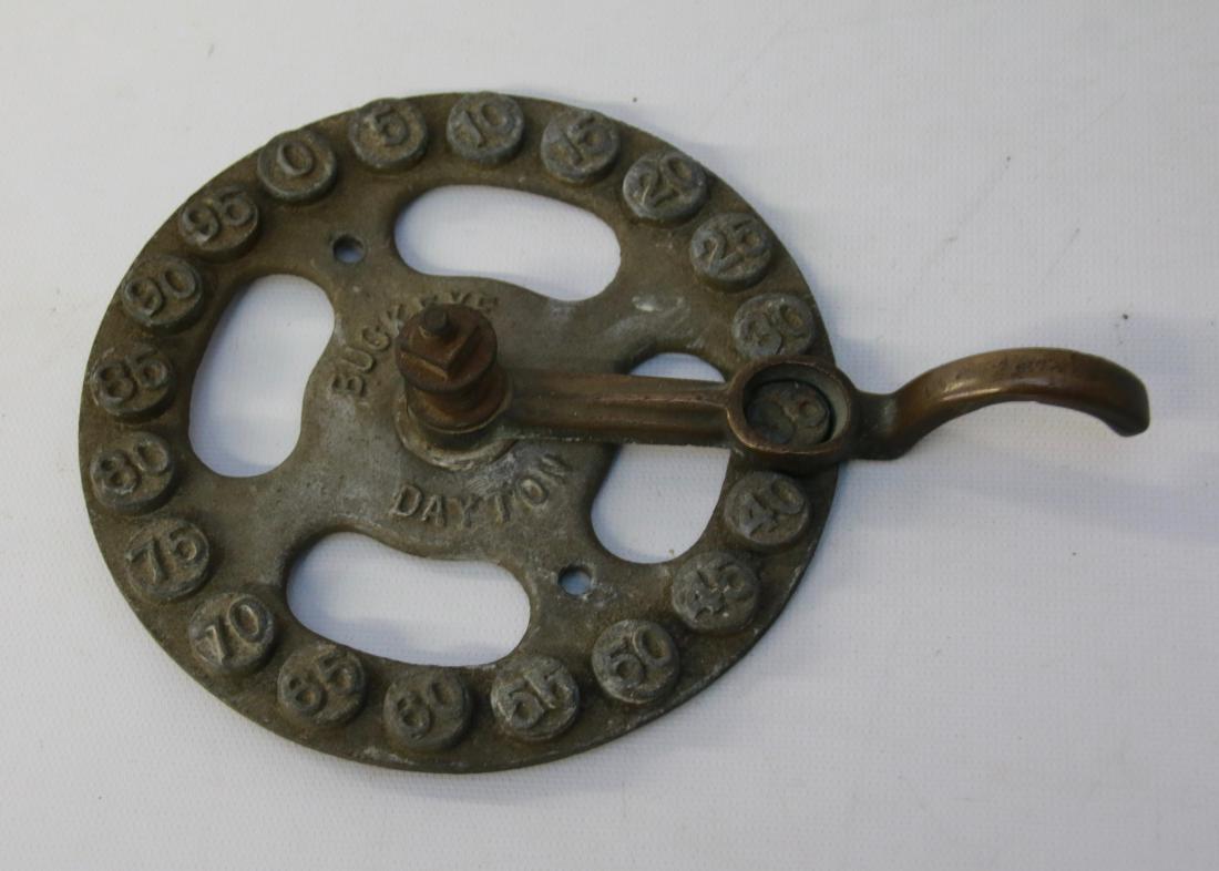 CAST METAL AND BRASS GAS PUMP: MARKED "BUCKEYE" - DAYTON, OH Dimensions:5 3/4" DIAMETER