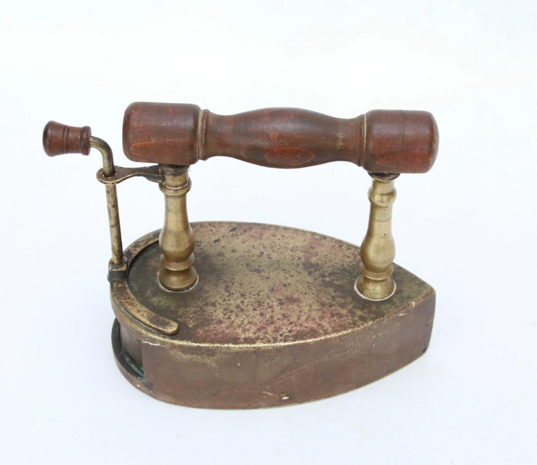 BRASS SLUG IRON: ROUND BACK WITH LIFT GATE - TURNED POSTS . 6 1/2"