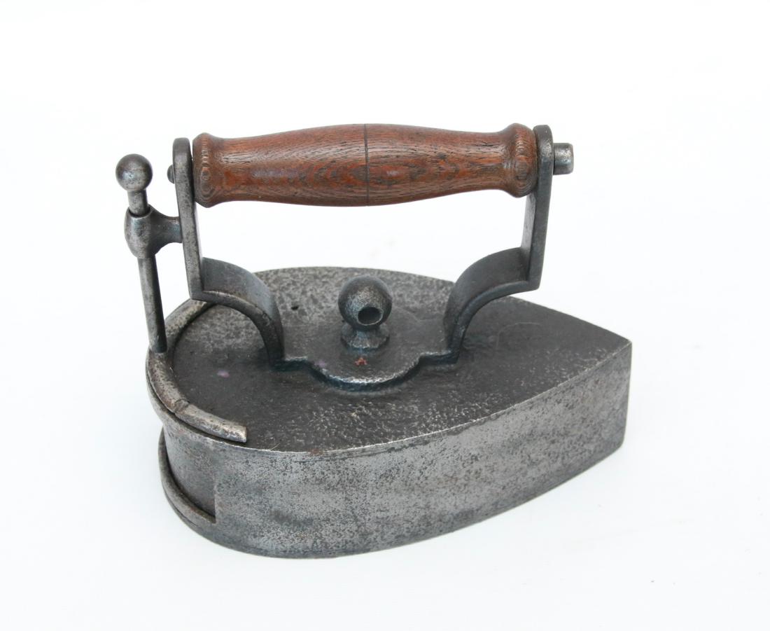 ROUND BACK SLUG IRON: LIFT UP GATE - CENTER FINIAL FOR POST ATTACHMENT . 8" X 6 1/2"
