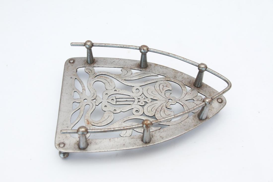 EARLY CUTWORK TRIVET: FENCE AND ENGRAVING - BALL FEET - ELABORATE DESIGN . 9 1/2" X 6"